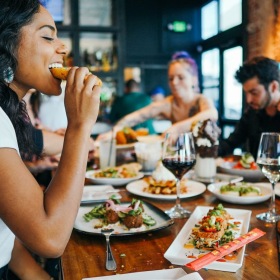 people eating food in a restaurant