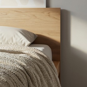 a bed with a pillow